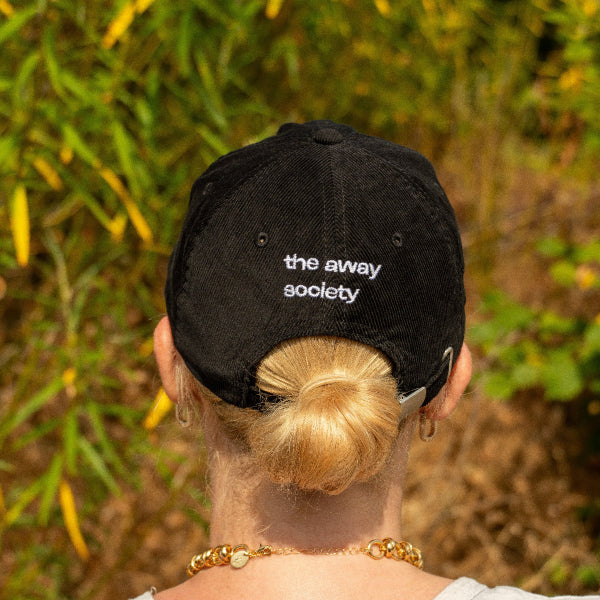 it's not done - black corduroy cap