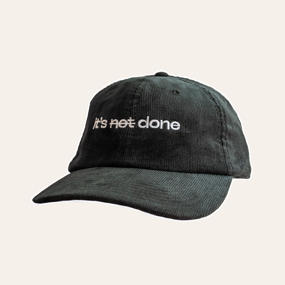it's not done - black corduroy cap